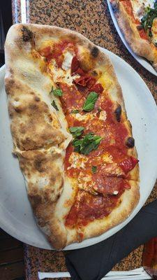 Mezzaluna, half calzone and half pizza. I chose the Diavola pizza and pepperoni in the calzone. IT WAS DELICIOUS.