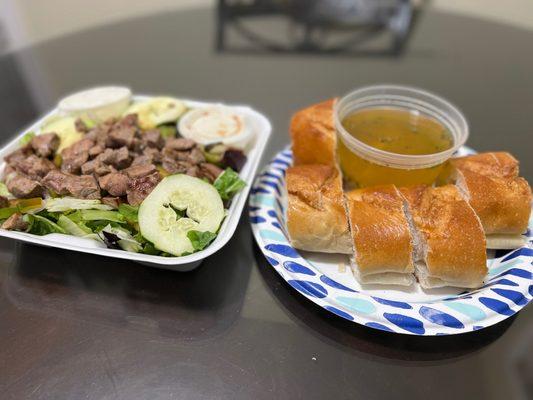 New York strip salad amazing fresh bread With a nice olive dipping oil.