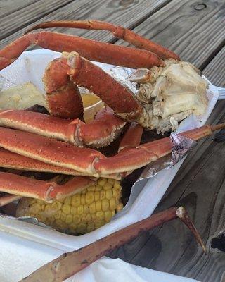 crab plate that comes with 2 clusters, 8 shrimp, sausage, corn and potatoes