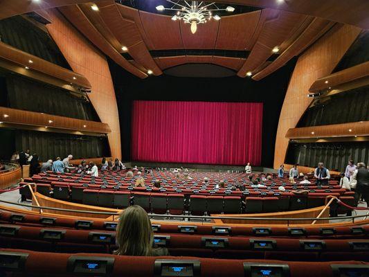 My seat in Parterre section facing stage. Note blue screens for info.  Also provides translations for opera performed in French and German.