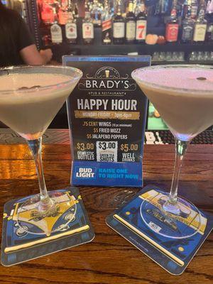 Happy Hour advertisement with delicious espresso martinis.