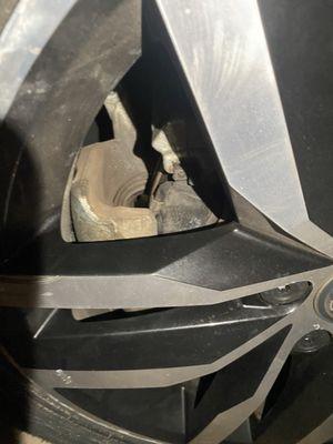 The caliper completely unsecured and condition this dealership provided the car in. They could care less they almost killed us!