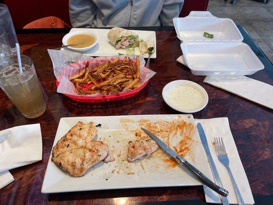 Blackened chicken dinner, fresh cut fries, Caesar chicken wrap.