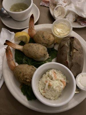 Baked Stuffed Shrimp with potato and coleslaw.