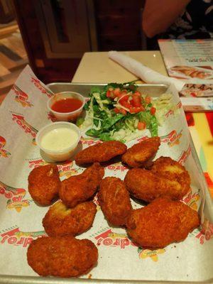 Stuffed jalapeño peppers with cheese.