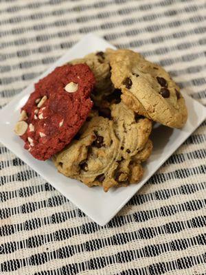 Red velvet with white chocolate, snickerdoodle, chocolate chip, & chocolate chip with pecans & pretzels