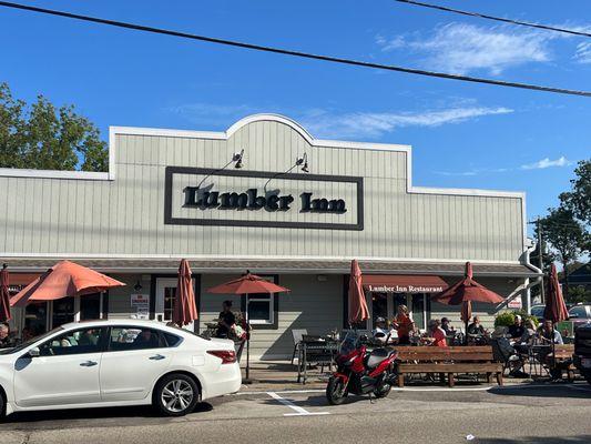 The front of the restaurant and patio seating