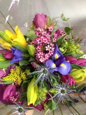 Lilies, tulips, irises, and thistle