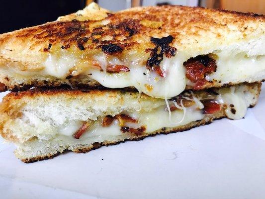 The Smokin' Cheddar grilled cheese. Wisconsin Applewood smoked cheddar, bacon, and honey. Yum!