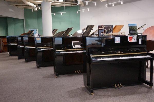 All Kawai up rights on display for you to play
and compare