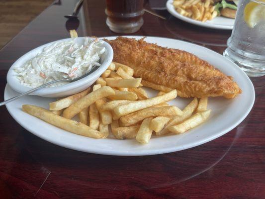 Fish and chips with coleslaw.