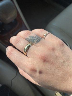 My grandfather's gold wedding band that now fits me perfectly :)