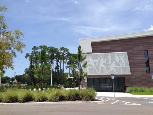 Front of building outside basketball area