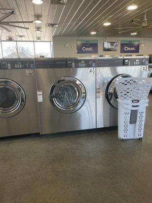 HUGE washers available in addition to regular size. I've washed 2 king comforter at once in one of these bad boys.