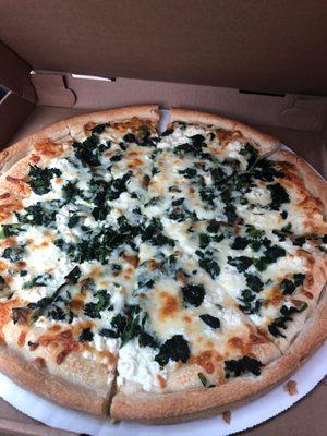 White pizza with spinach and feta. (Going to try the white sauce next time)