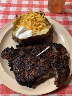 1-1/4" Ribeye with loaded Baked Potato