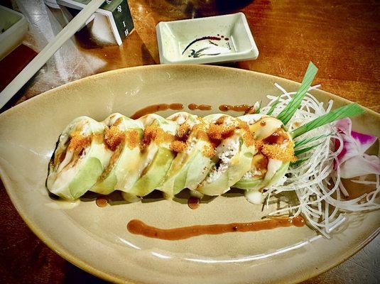 Hole-in-One Roll (cucumber outside/crab salad middle/maguro,sake,hamachi inside/spicy garlic mayo sauces)