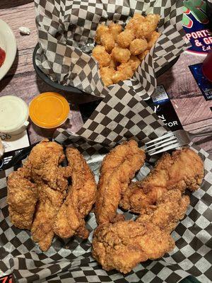 Chicken strips and potato puffs