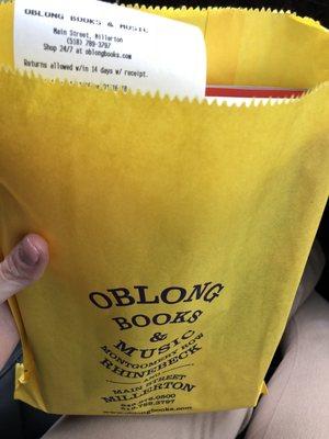 Happy yellow bag for my book (with receipt tucked in the cover).