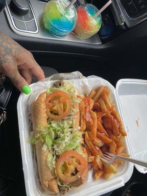 Philly cheese steak sandwich with fries and mild Sauce