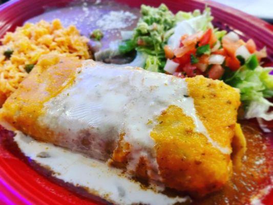 Fried beef burrito, rice, and beans