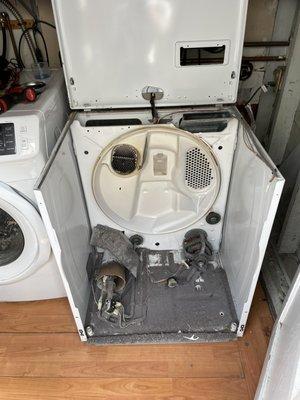 Cleaned inside dryer from lint. Periodic maintenance procedure to keep appliance safe and working