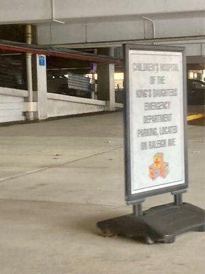 Parking garage signage to park on Raleigh Ave for the Emergency Dept