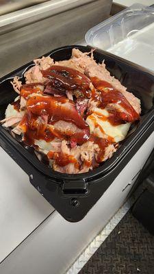 Our Freedom Bowl featuring our signature loaded mashed potatoes, pulled pork and bbq sauce