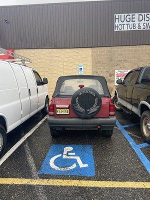 Parked in a handicap spot.