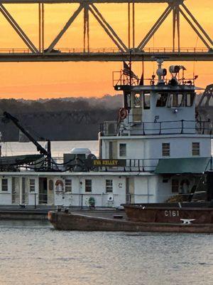 Ohio River, Sunset ,barge going under Kennedy Bridge