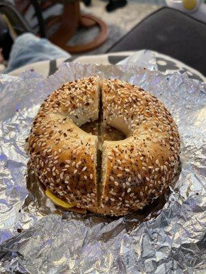 Sausage, egg and cheese on an everything bagel