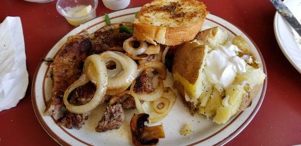 Bison Hamberger Steak with sauteed onions an mushrooms