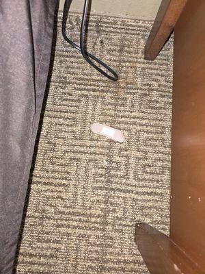 A band-aid on the floor upon check in