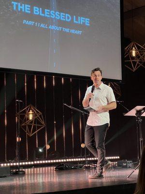 Pastor Matt speaking during service.