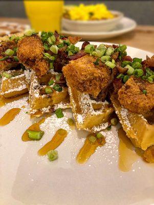 Now Open for Breakfast and Lunch - Cajun friend chicken and waffles, with bacon, green onions, honey and syrup.