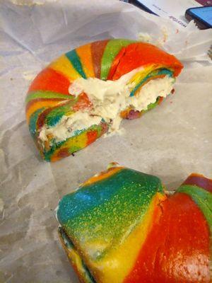 rainbow bagel with walnut raisin cream cheese