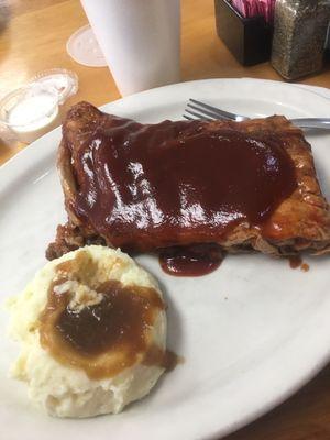 BBQ Ribs (Thurs lunch special). You get two sides. I ordered the mashed potatoes and gravy with a side salad and ranch dressing!