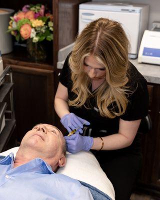 Our Aesthetic Nurse Injector, Alexis, performing PRP Hair Restoration Treatments