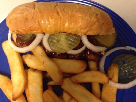 Boneless BBQ Rib sandwich served with sweet onion, pickles & a Sweet BQ sauce.