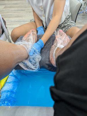 Paraffin wax on both feet