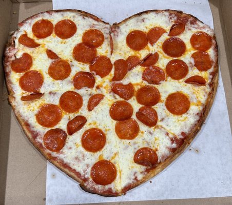 Heart shaped pepperoni pizza