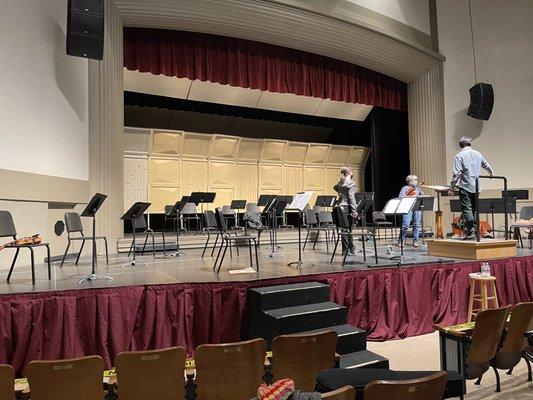 Yu-Ting preparing stage for Bozeman Symphony