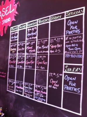 The weekly schedule on the chalk board.