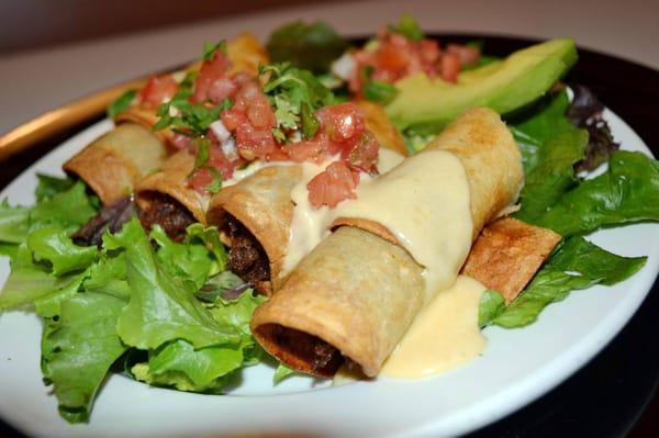 Super fresh Cali Mex .. Our Flautas Con Crema are stuffed with tender, juicy meats and flash fried until golden.