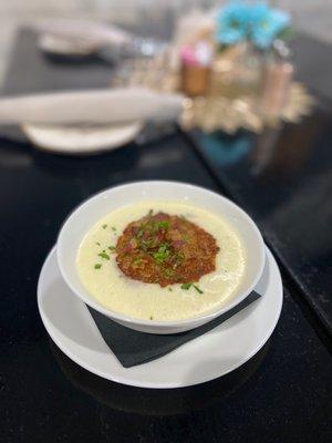 Sheep cheese soup with potato pancake and bacon