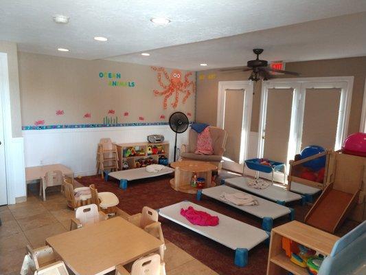 Our Wobbler (walking-24 months) classroom preparing for Nap time