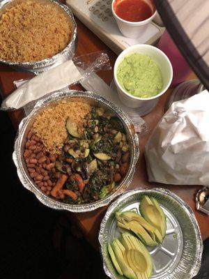 Vegetarian plate, guacamole, rice, avocado