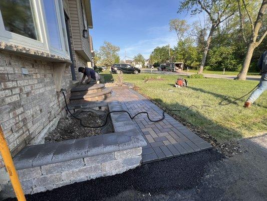 Retaining wall and brick sidewalk