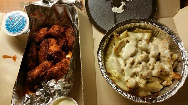 Wings and chicken alfredo pasta