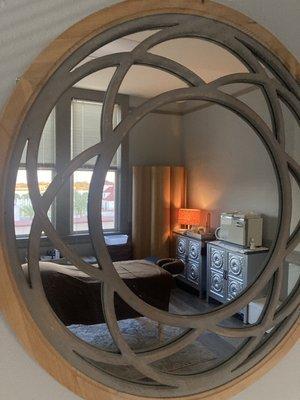 A mirror view of one of the massage rooms.